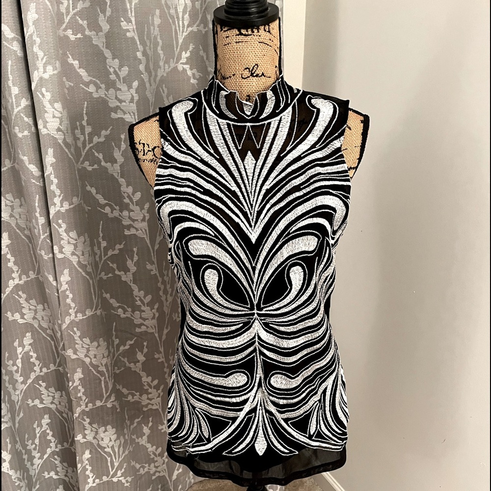 Black and silver top.